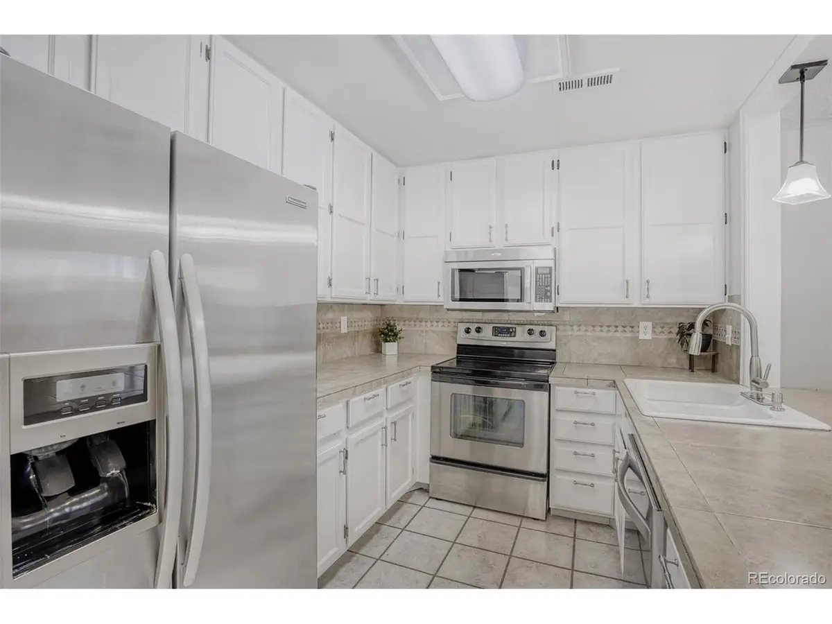 12404 E Tennessee Cir #F, Aurora, CO 80012 - #1
