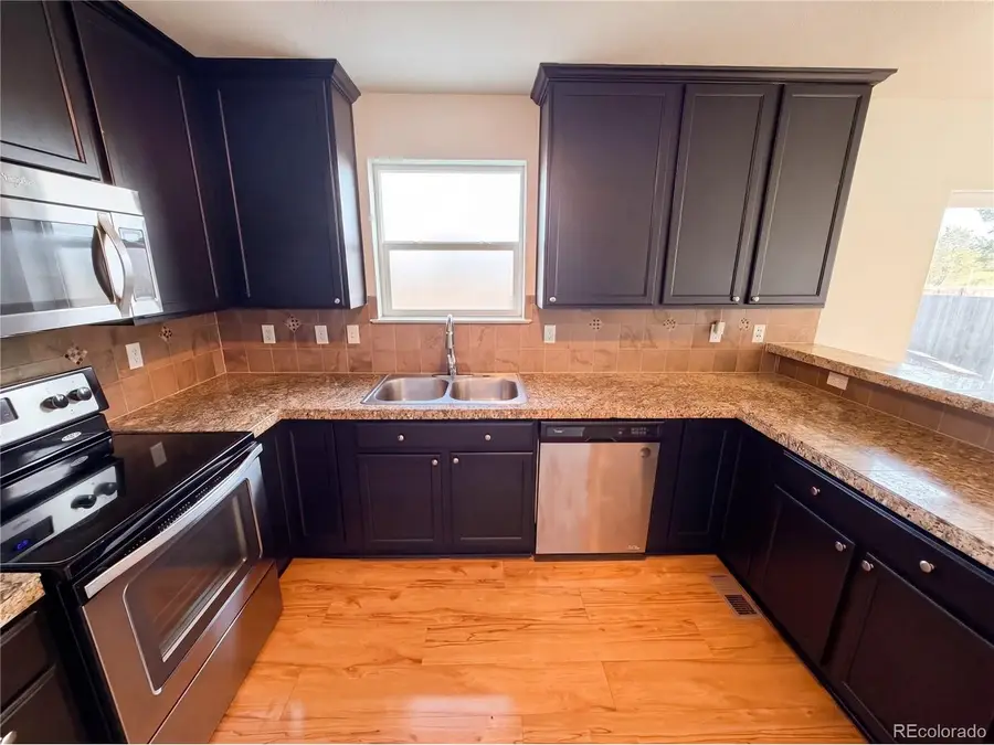 2084 Basil St, Strasburg, CO 80136 - #2