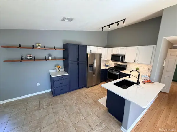 8485 Pebble Creek Way #13-203, Highlands Ranch, CO 80126