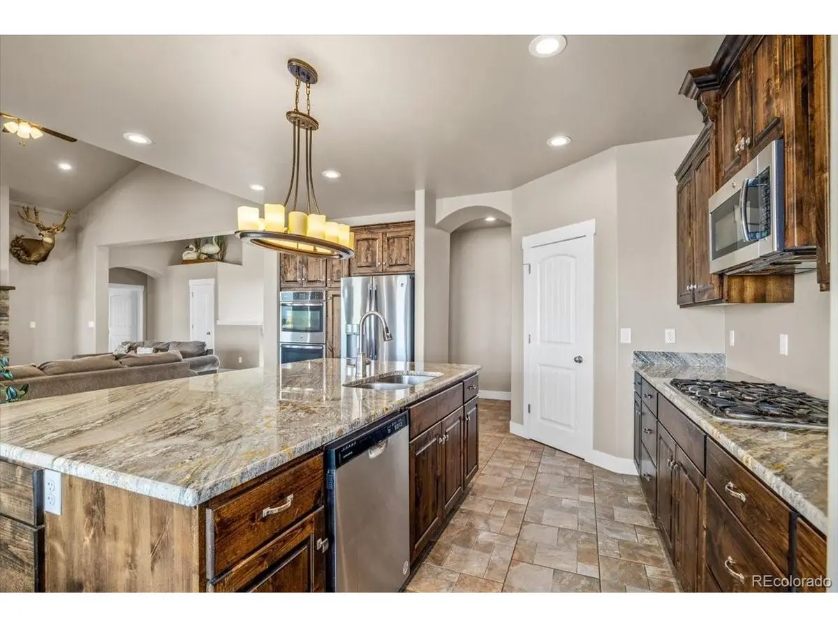 45425 Wolf Creek Dr, Bennett, CO 80102 - #1