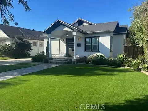 4041 Denker, Los Angeles, CA 90062