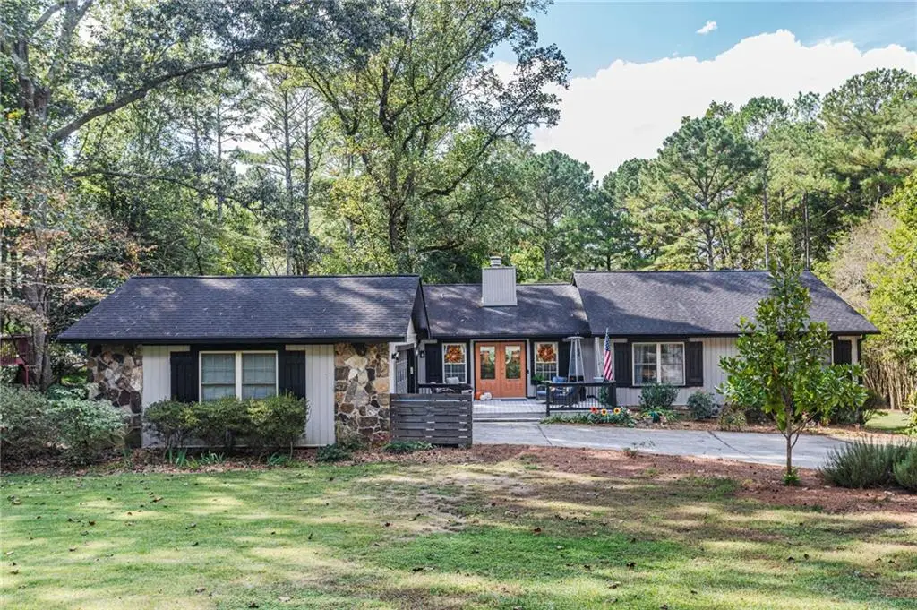 3725 Hunting Ridge Drive Sw, Lilburn, GA 30047 - Image #1