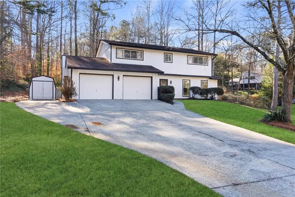 3428 Runelle Place Sw, Lilburn, GA 30047 - Image #1
