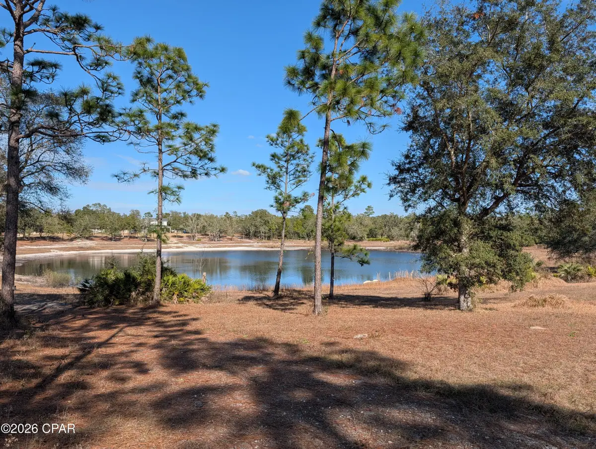 13920 Woodland Road, Southport, FL 32409 - Image #1
