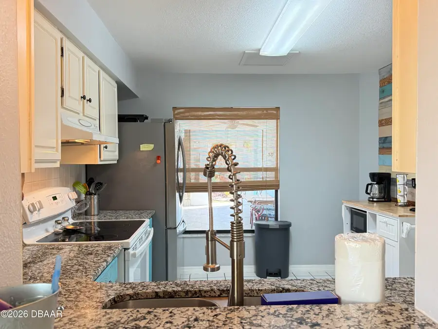 828 E 23rd Avenue, New Smyrna Beach, FL 32169 - #2