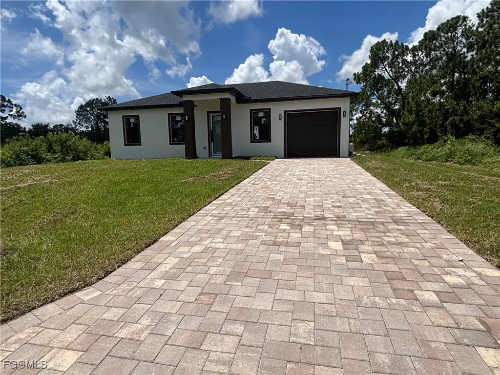 1034 Iris Street E, Lehigh Acres, FL 33974 - Image #1