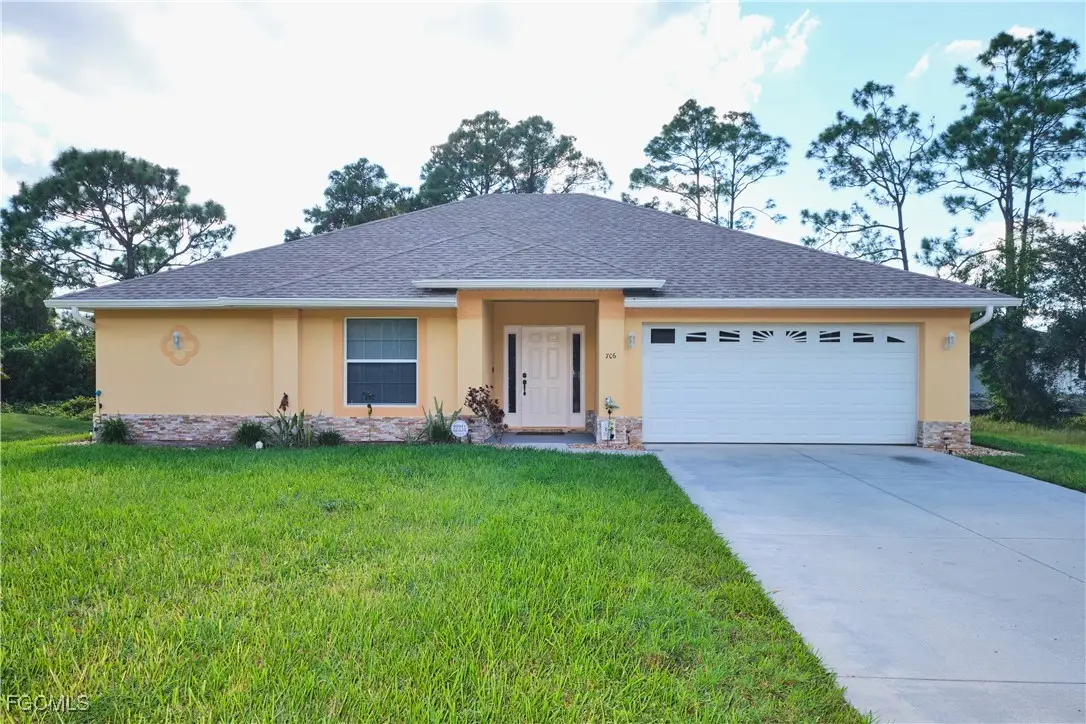 706 Creuset Avenue S, Lehigh Acres, FL 33974 - Image #1
