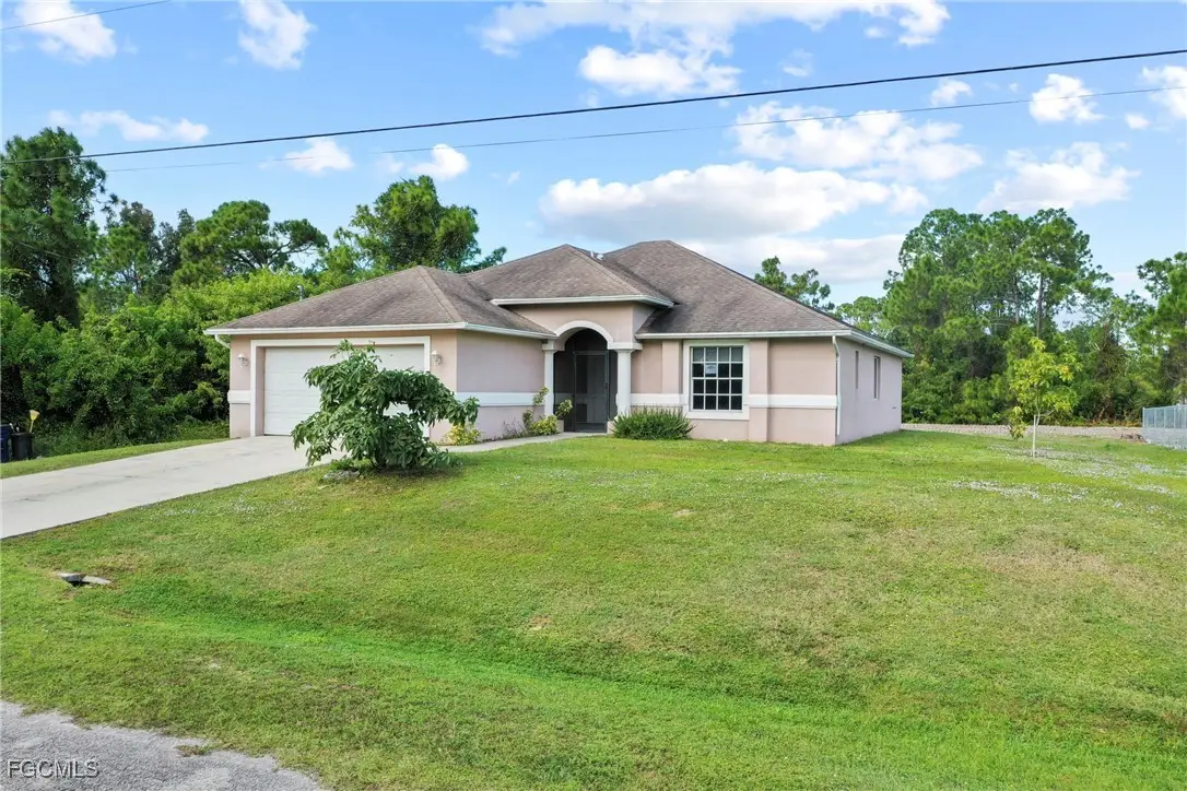 723 Newell Street E, Lehigh Acres, FL 33974 - Image #1