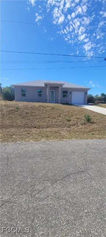 402 Harrison Drive, Lehigh Acres, FL 33936 - #2
