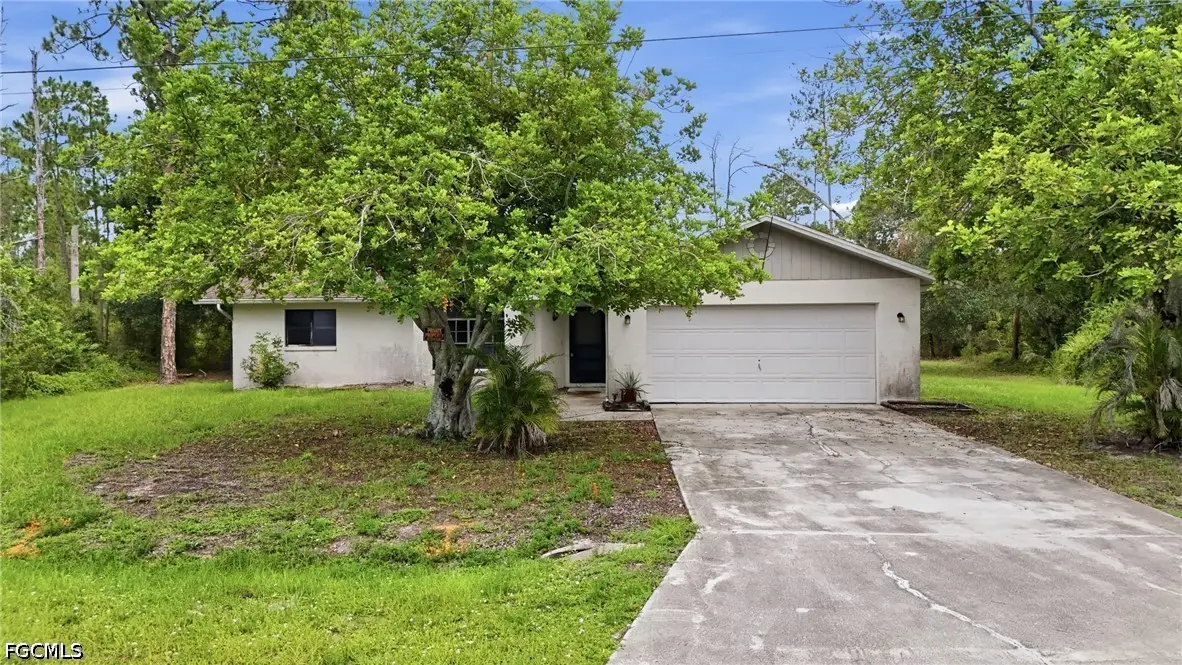 906 Wells Avenue, Lehigh Acres, FL 33972 - #1