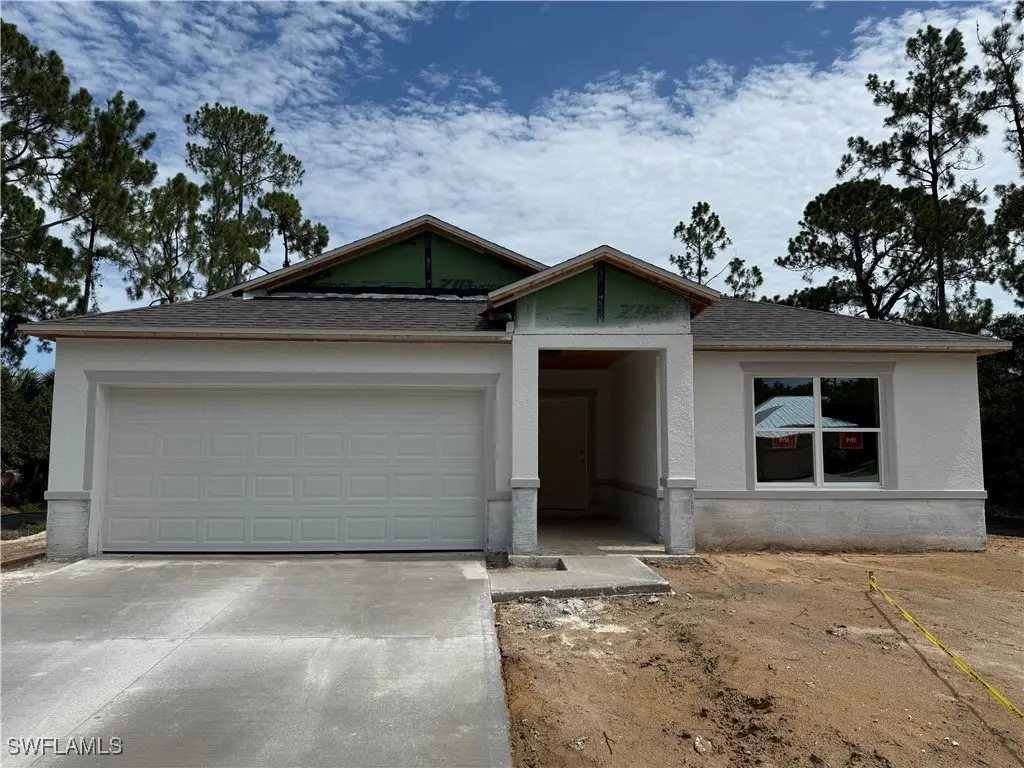 1039 Asther Street E, Lehigh Acres, FL 33974 - Image #1