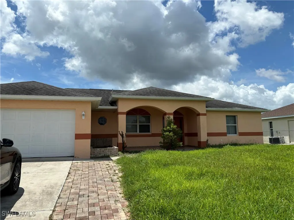 546 Long Island Street E, Lehigh Acres, FL 33974 - Image #1