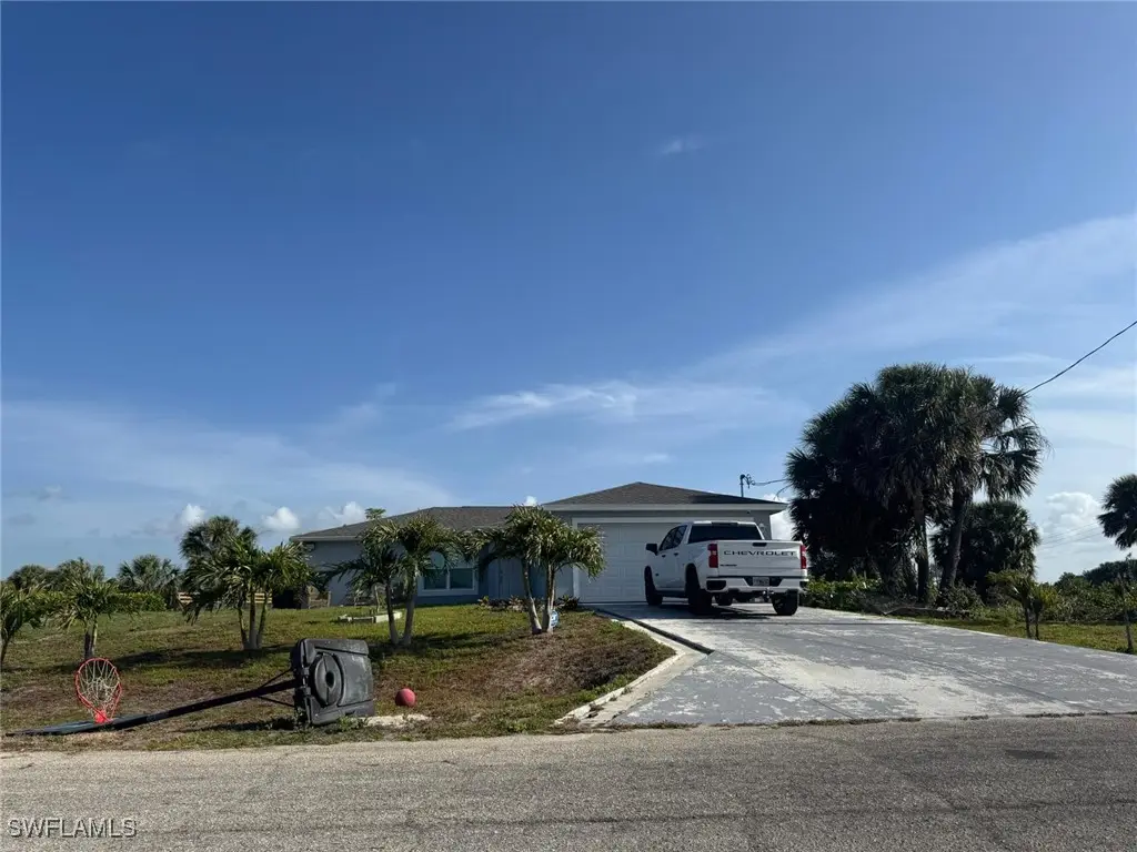 1046 Saturn Court, Port Labelle, FL 33945 - Image #1