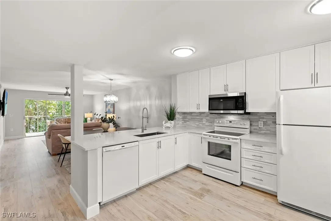 3071 Sandpiper Bay Circle #L205, Naples, FL 34112 - Image #1