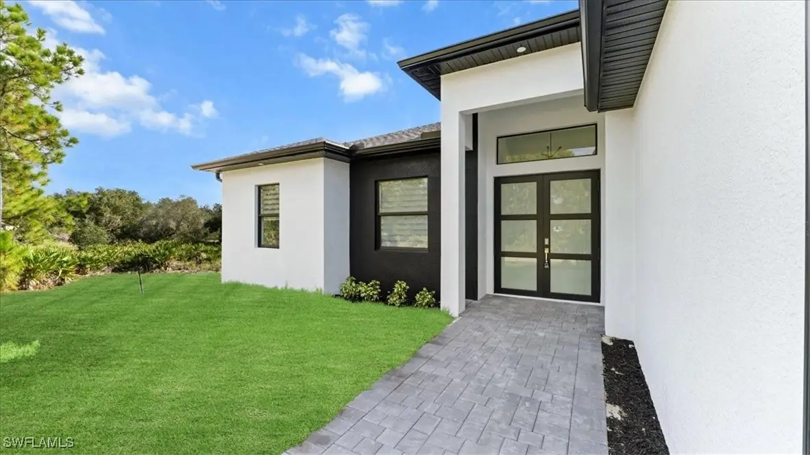 1017 Wellington Avenue, Lehigh Acres, FL 33972 - Image #1