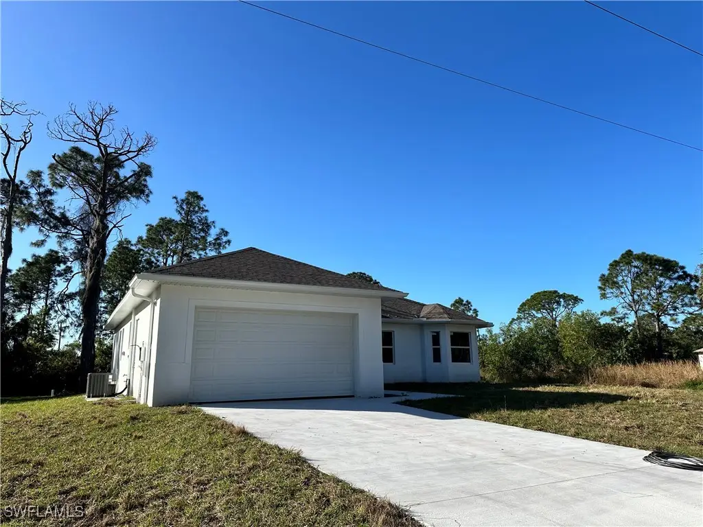 718 Chattman Street E, Lehigh Acres, FL 33974 - Image #1