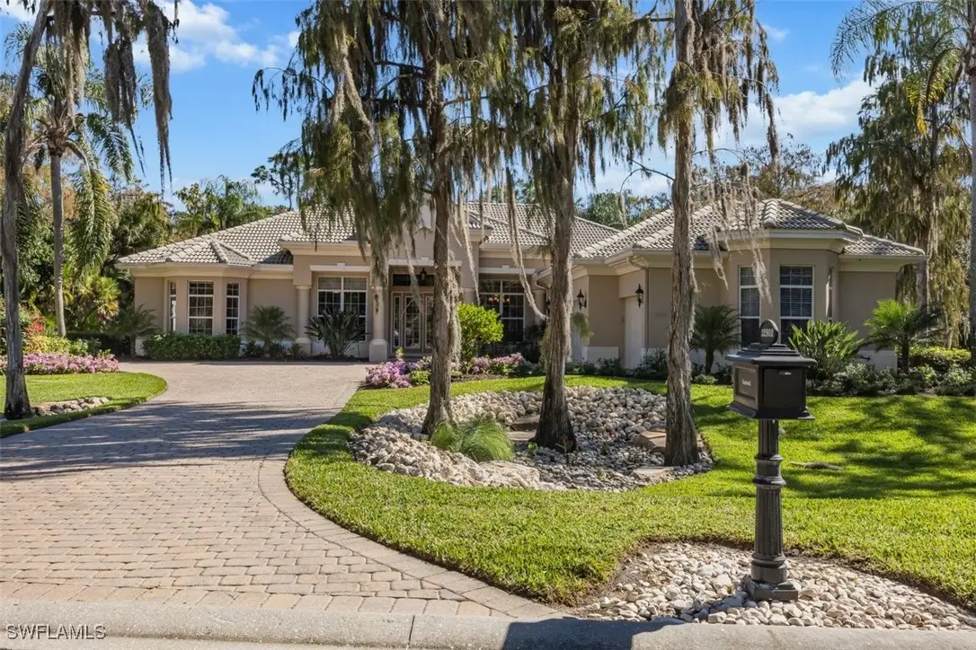 12902 Pond Apple Drive W, Naples, FL 34119 - Image #1