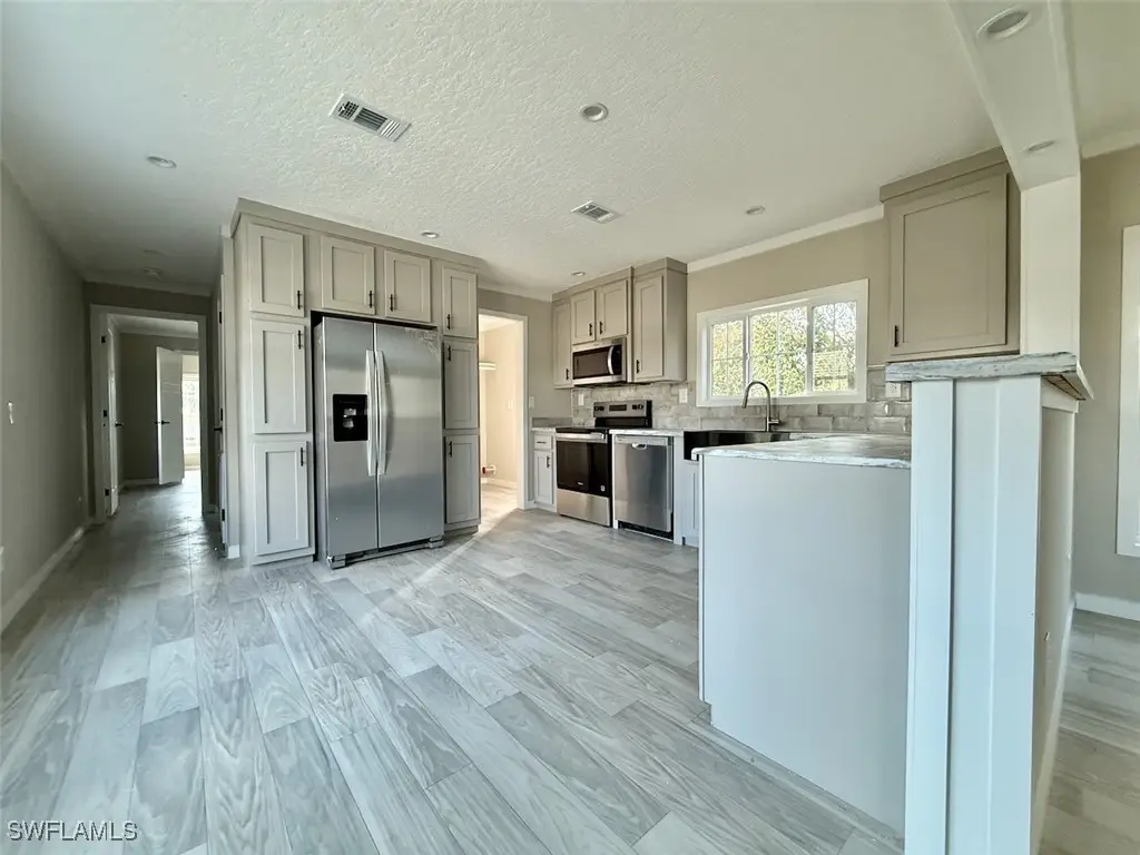 8104 Marx Drive, North Fort Myers, FL 33917 - Image #1