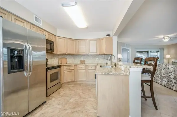 9589 Crescent Garden Drive #C-102, Naples, FL 34109