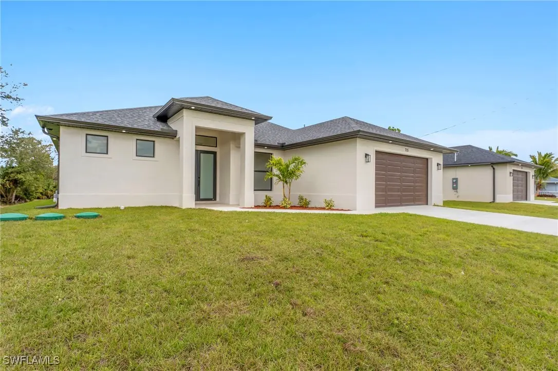 715 Theodore Vail Street E, Lehigh Acres, FL 33974 - Image #1