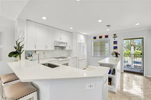 7742 Emerald Circle #V203, Naples, FL 34109