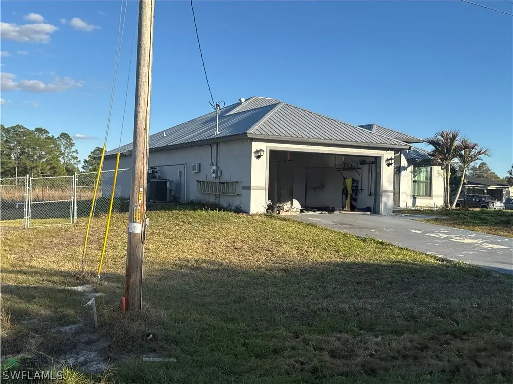 717 Fleming Avenue S, Lehigh Acres, FL 33974 - #1