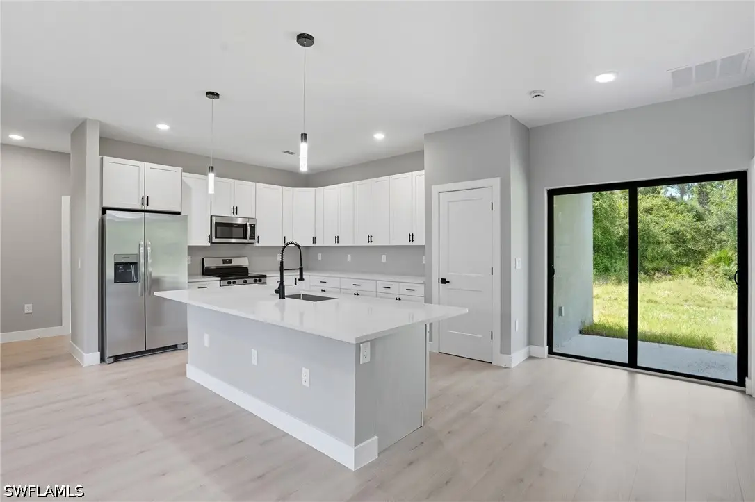 216 Ogden Avenue S, Lehigh Acres, FL 33974 - #1