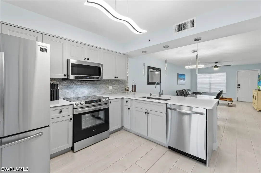 4975 Sandra Bay Drive #103, Naples, FL 34109 - #1