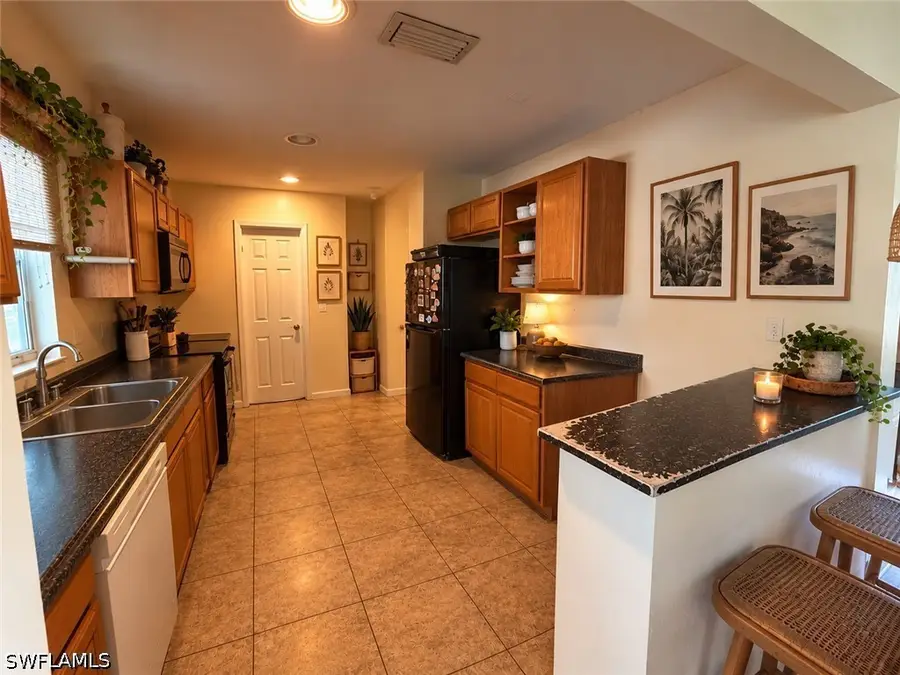 11 Louisiana Road, Lehigh Acres, FL 33936 - #3