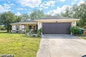 122 Teakwood Drive, Lehigh Acres, FL 33974 - #2