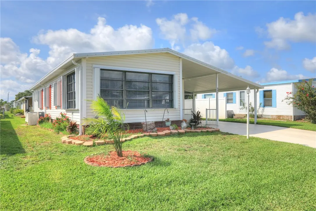 909 Jacaranda Drive, Barefoot Bay, FL 32976 - #1