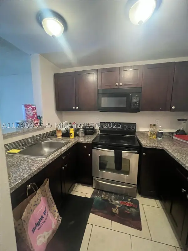 482 NW 165th St #A203, Miami, FL 33169