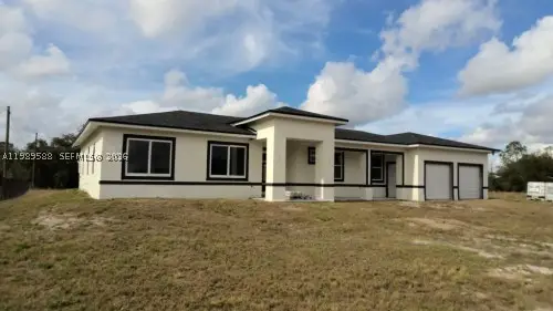 1715 Mcarthur, Lehigh Acres, FL 33972