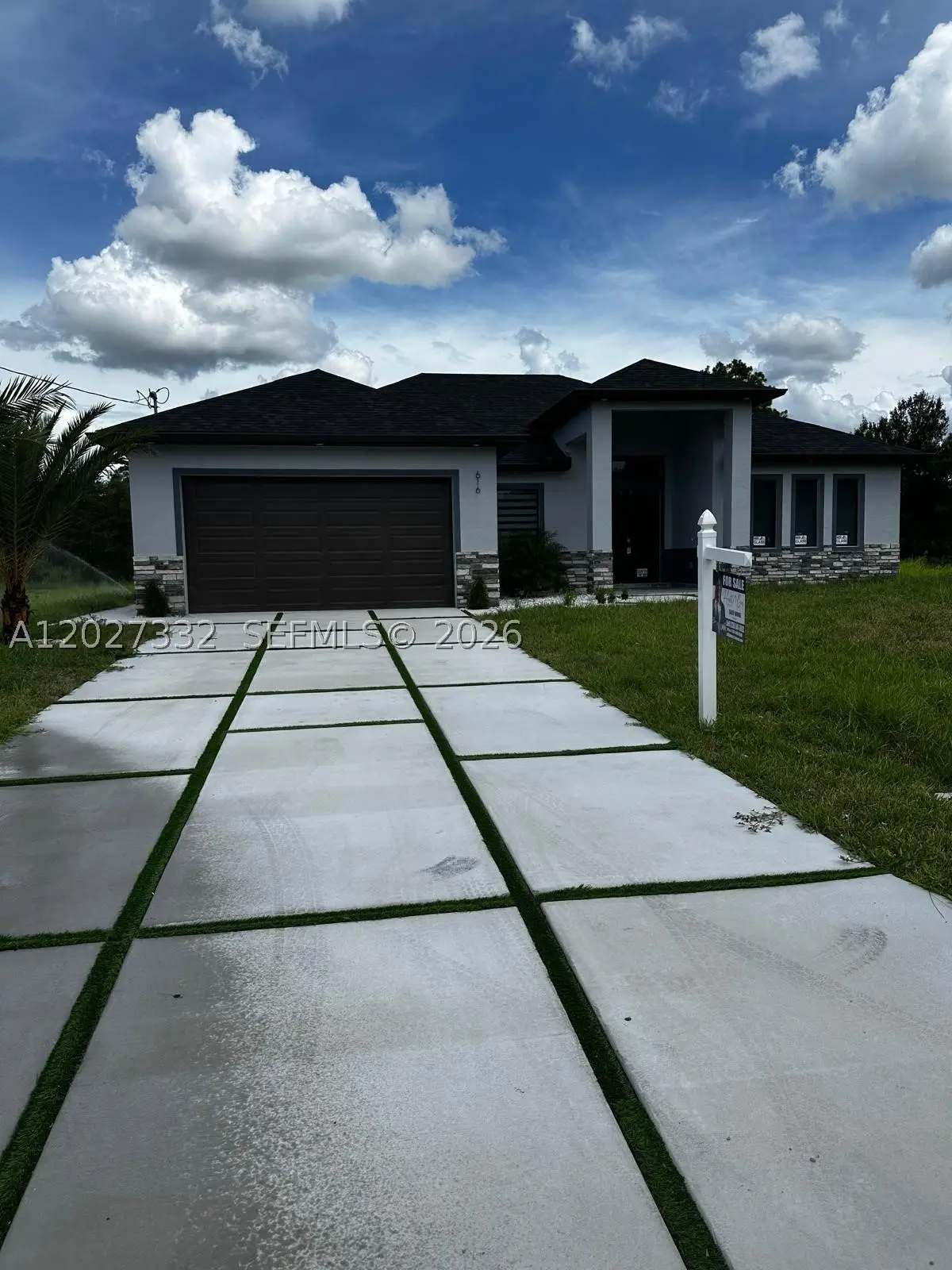 616 Maple Ave N, Lehigh Acres, FL 33972 - #1