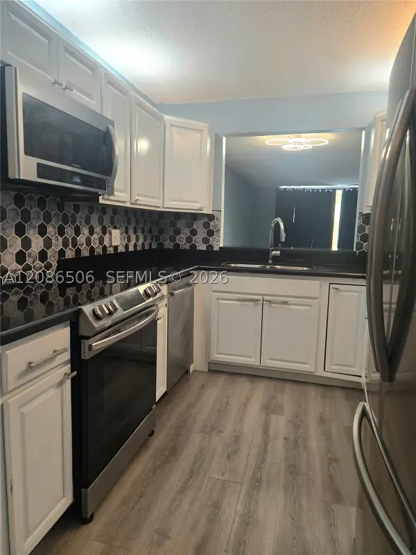 600 NW NW 214th #104, Miami Gardens, FL 33169