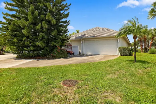 173 Orange Tree, Atlantis, FL 33462