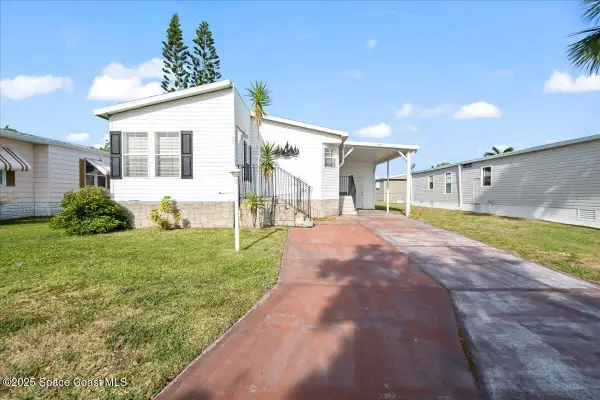 641 Hyacinth Circle, Barefoot Bay, FL 32976