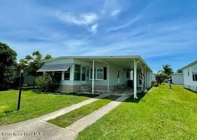 911 Oriole Circle, Barefoot Bay, FL 32976 - Image #1