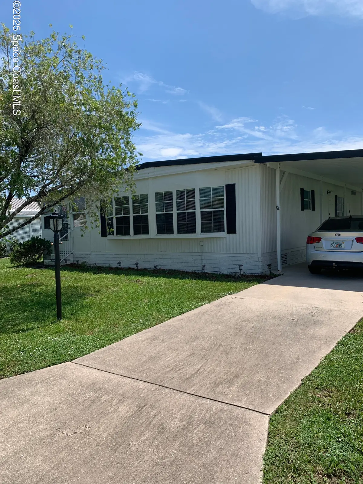 913 Fir Street, Barefoot Bay, FL 32976 - Image #1