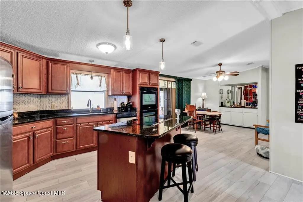 729 Gladiolus Drive, Barefoot Bay, FL 32976 - #1