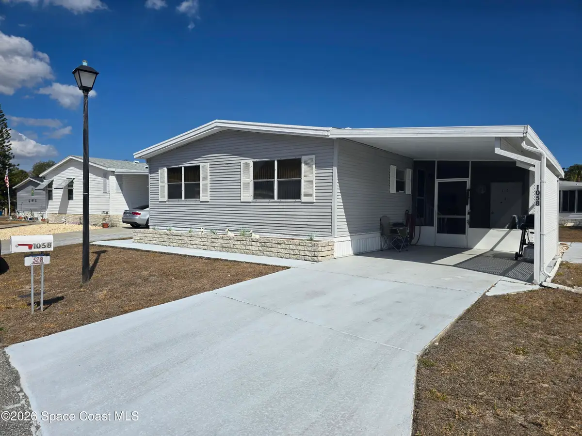 1058 Moonlight Court Ne, Palm Bay, FL 32907 - Image #1