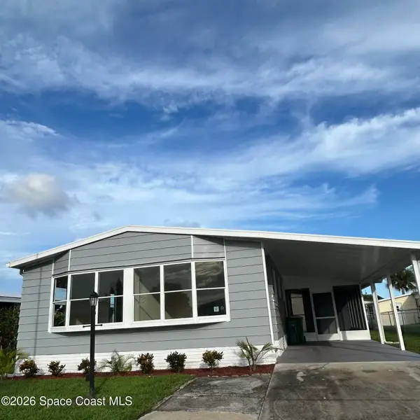 911 Hyacinth Circle, Barefoot Bay, FL 32976