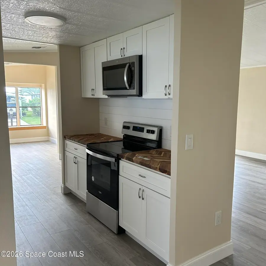 911 Hyacinth Circle, Barefoot Bay, FL 32976 - #3
