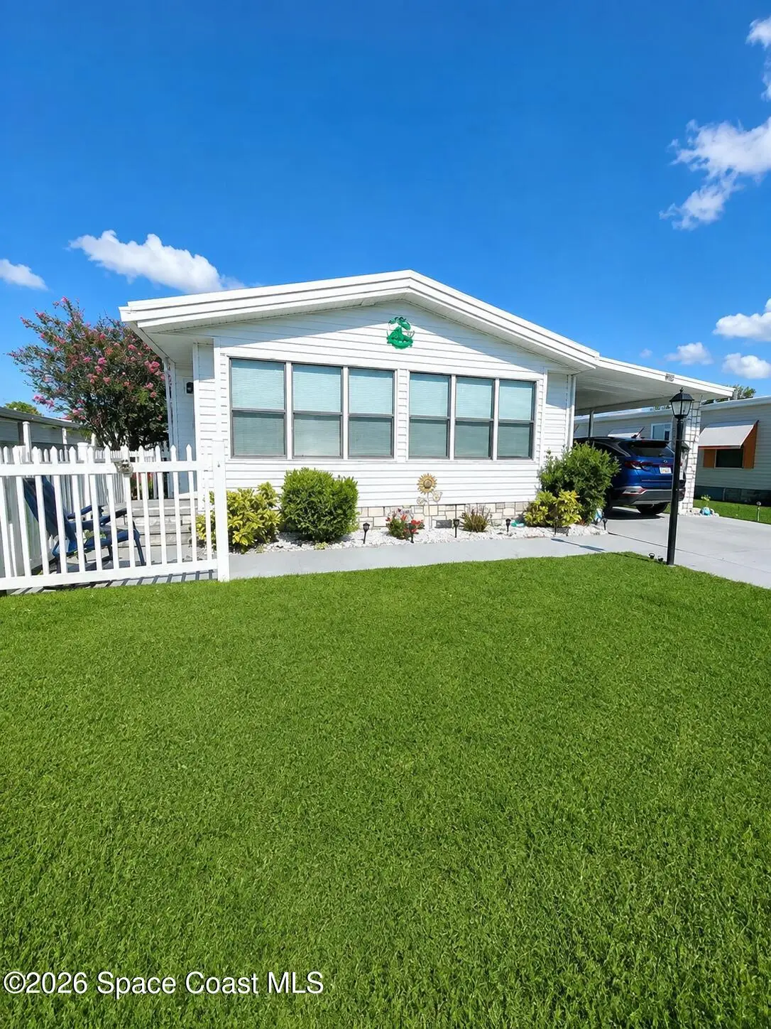 920 Hyacinth Circle, Barefoot Bay, FL 32976 - #1