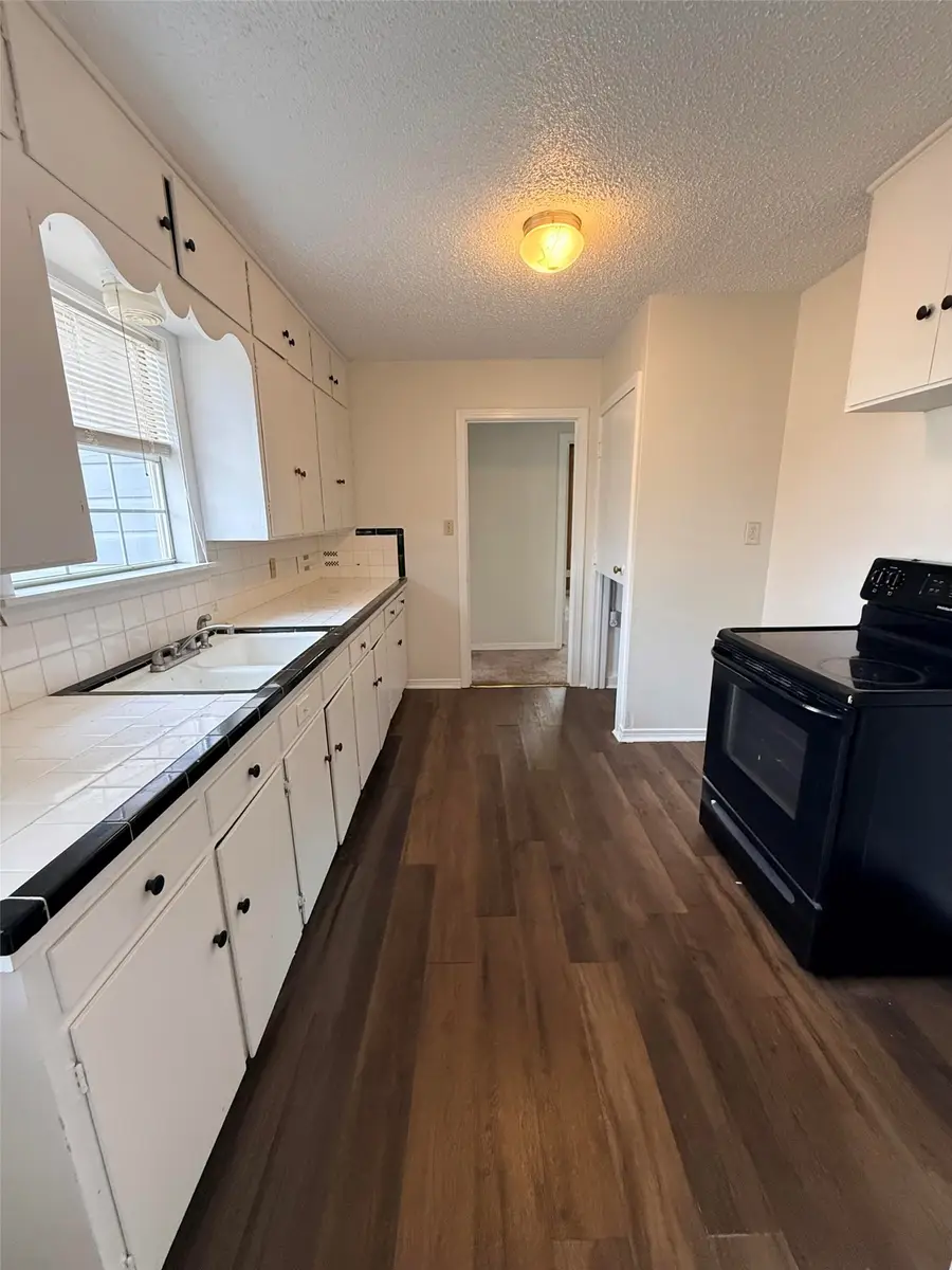 203 E 7th Street, Kaufman, TX 75142 - #3