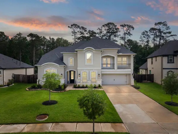 1021 Lakemont Bend Lane, Pinehurst, TX 77362