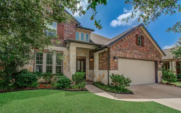 10506 Hartfield Bluff Lane, Cypress, TX 77433