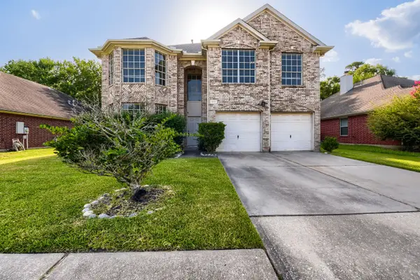 18715 Woodglen Shadows Drive, Humble, TX 77346