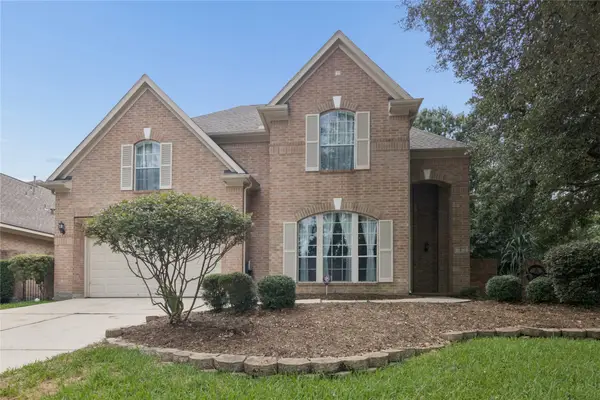 2 Surrey Run Place, The Woodlands, TX 77384