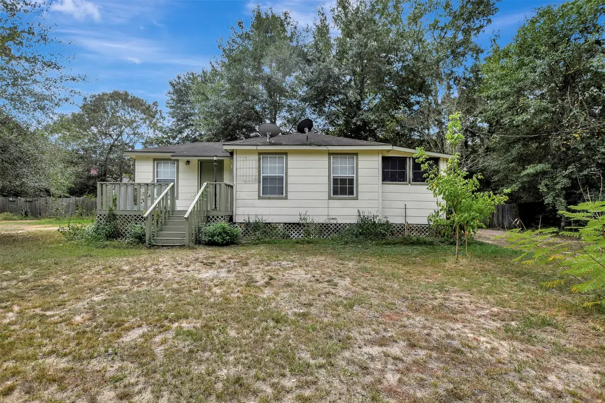 11076 Woodside Drive, Plantersville, TX 77363 - Image #1